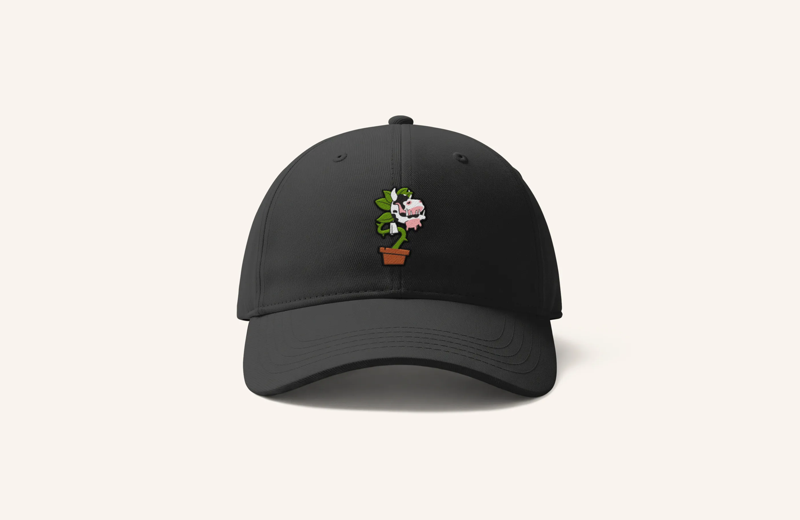 Black dad hat featuring embroidered Cowplant.