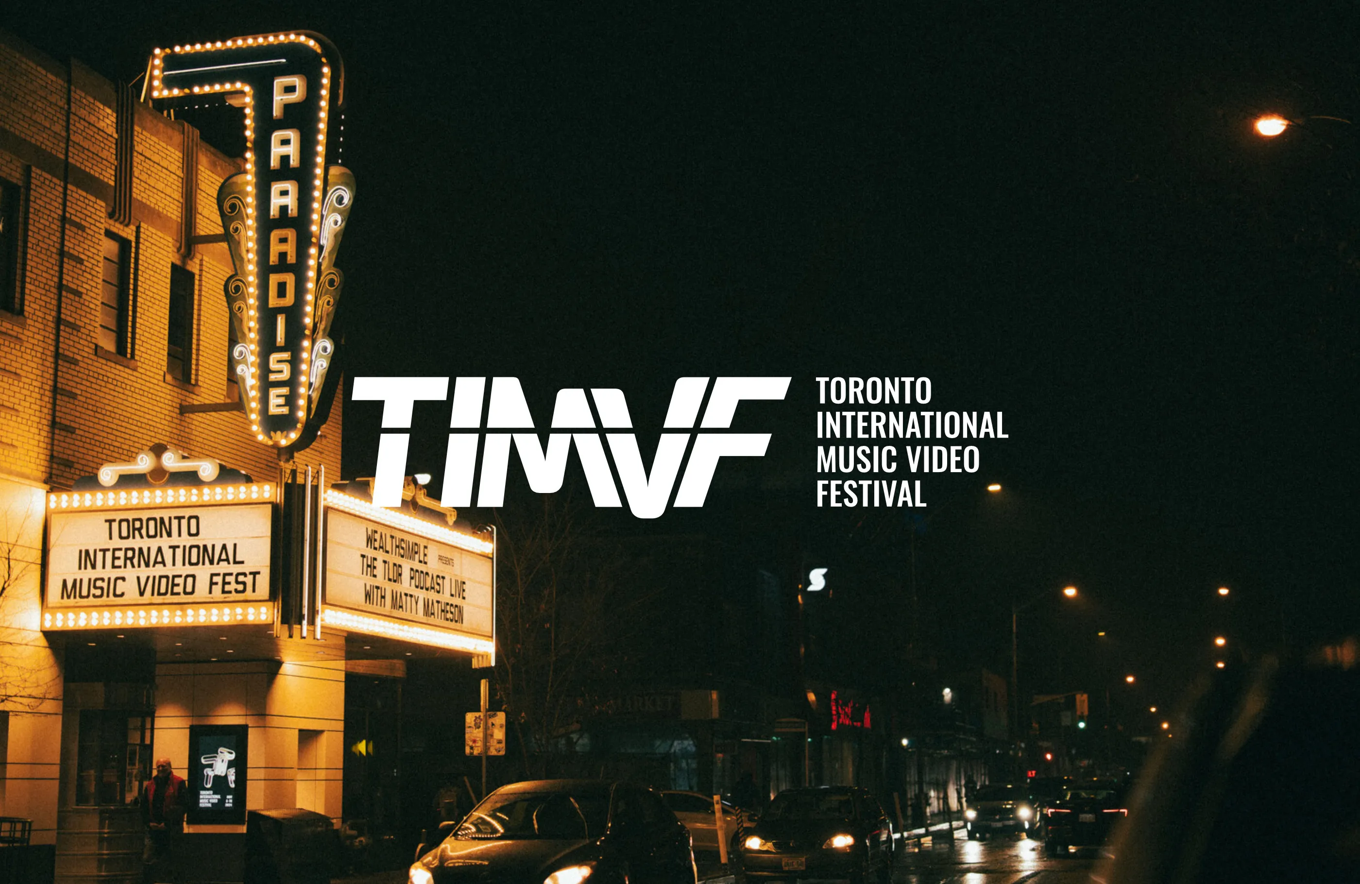 Photo of the Paradise Theatre in Toronto, home to 2024's festival, overlaid with the TIMVF wordmark.